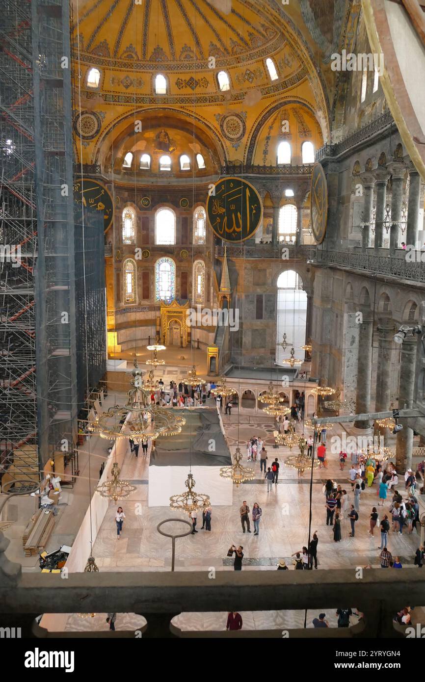 The Arch of Constantine; triumphal arch in Rome, situated between the Colosseum and the Palatine Hill. It was erected by the Roman Senate to commemorate Constantine I's victory over Maxentius at the Battle of Milvian Bridge in 312. Dedicated in 315, it is the largest Roman triumphal arch. Stock Photo