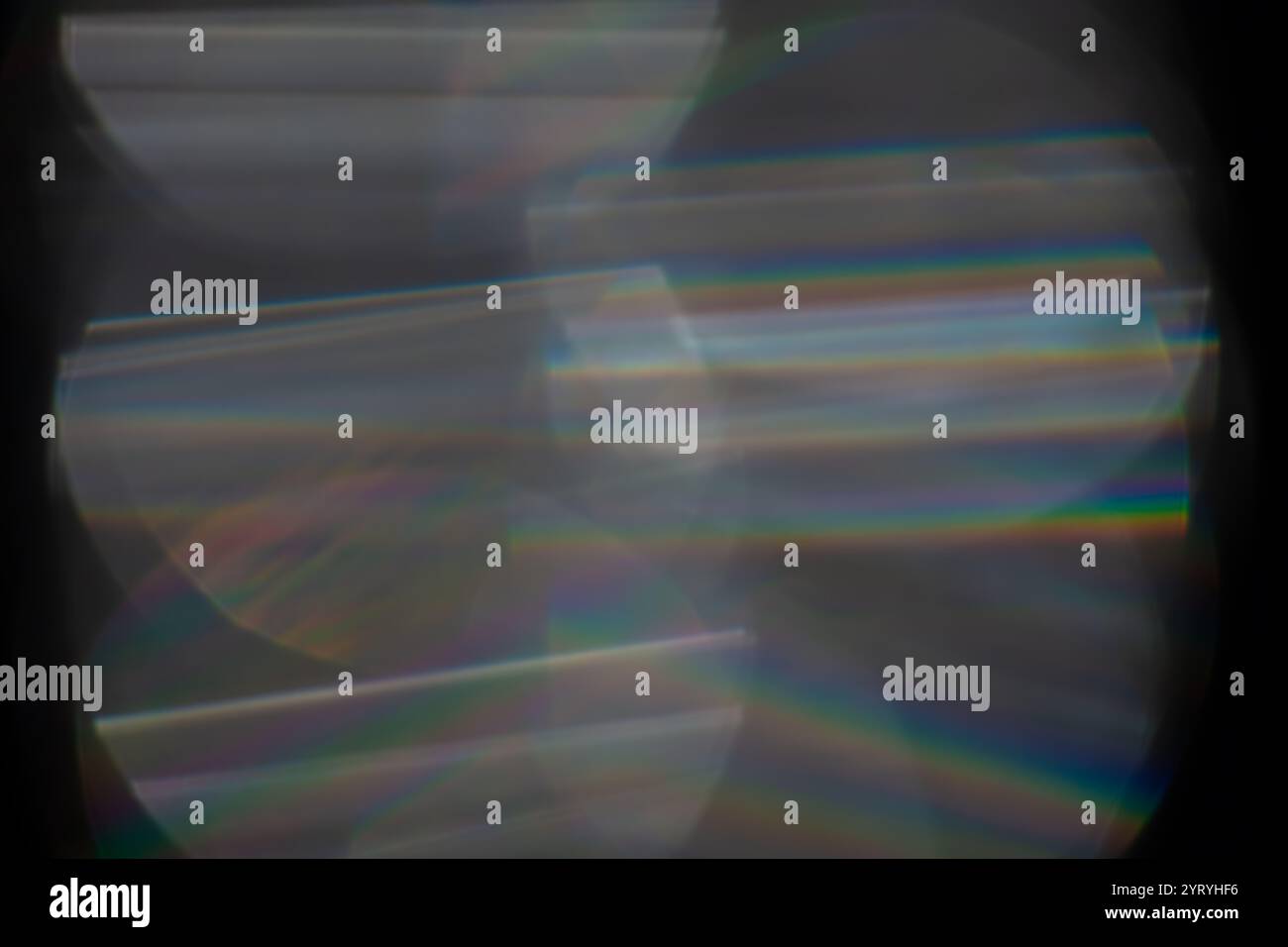 Glare effect on a black background. An abstract lens flare for on ...