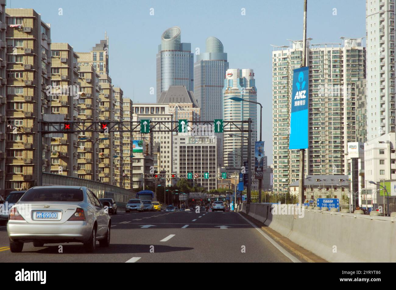 Shanghai in the People's Republic of China. It is located on the southern estuary of the Yangtze, with the Huangpu River flowing through it. With a population of 24.28 million as of 2019, it is the most populous urban area in China and the second most populous city proper in the world. Shanghai is a global centre for finance, innovation and transportation and the Port of Shanghai is the world's busiest container port. 2014 Stock Photo