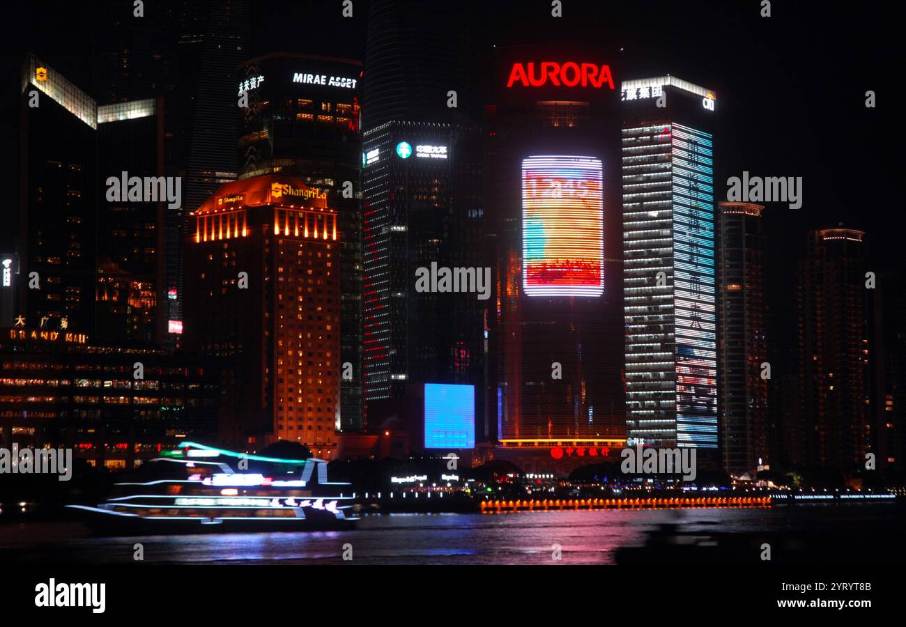 Shanghai in the People's Republic of China. It is located on the southern estuary of the Yangtze, with the Huangpu River flowing through it. With a population of 24.28 million as of 2019, it is the most populous urban area in China and the second most populous city proper in the world. Shanghai is a global centre for finance, innovation and transportation and the Port of Shanghai is the world's busiest container port. 2014 Stock Photo