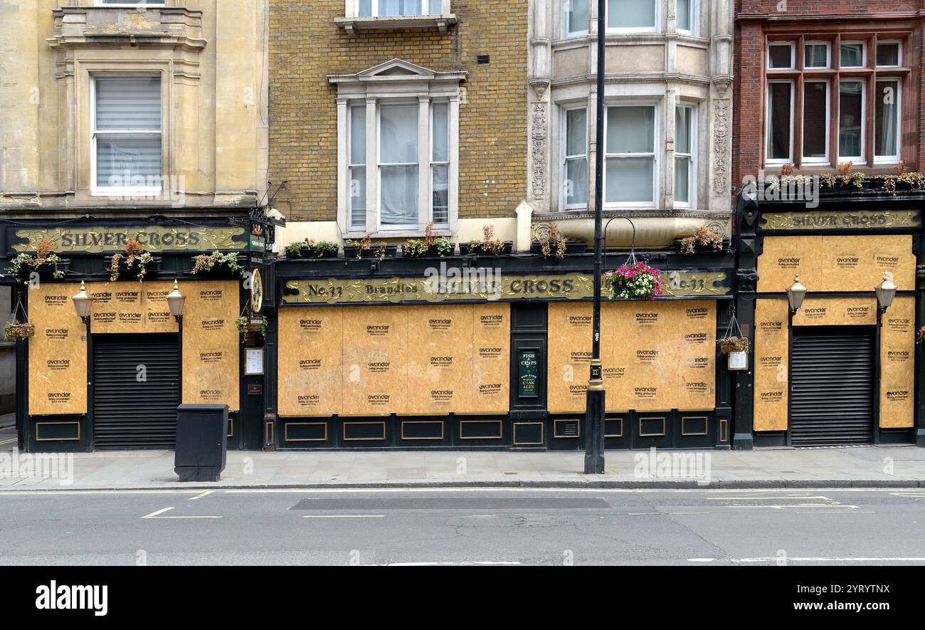 Businesses  including pubs closed and boarded up in London, during the Corona virus outbreak. 15th June 2020 Stock Photo