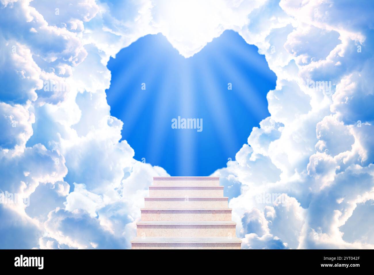 Stairs leading to light in sky through heart shaped gap in clouds. Love of God, concept Stock Photo