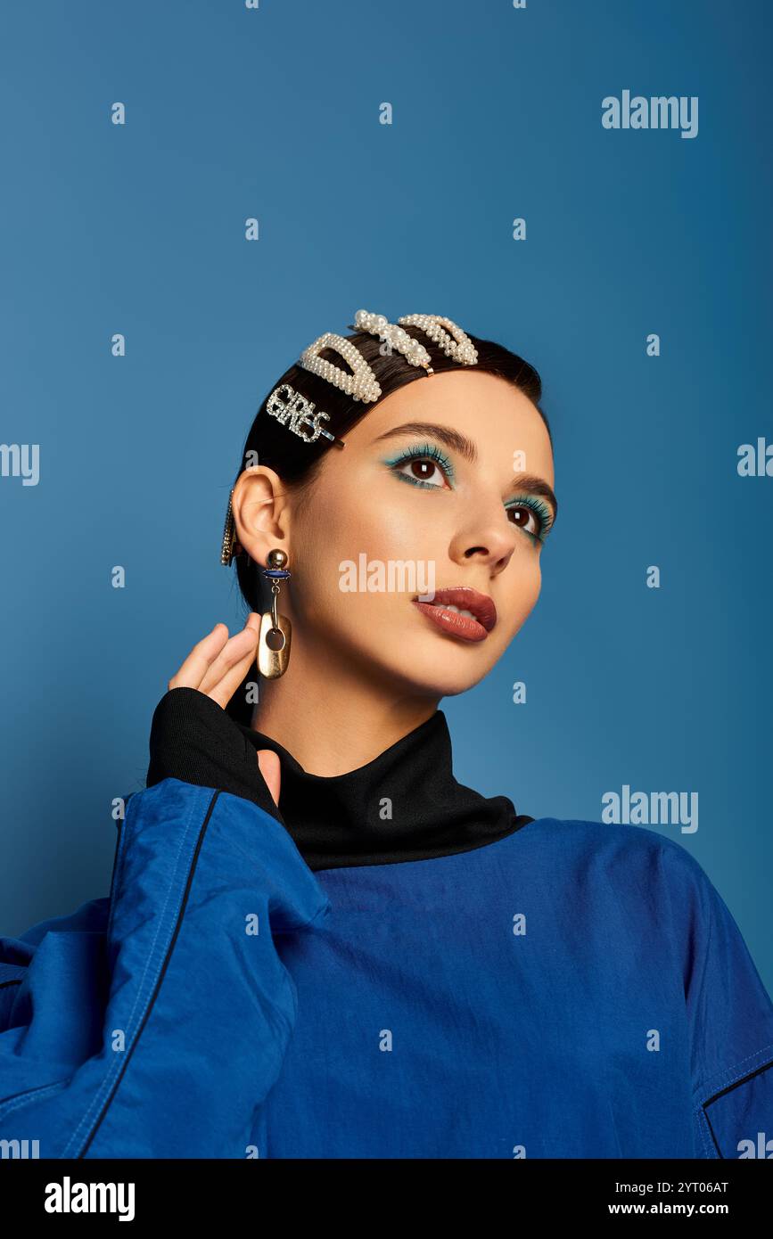 Fashionable young woman poses gracefully with stylish hair clips on a ...