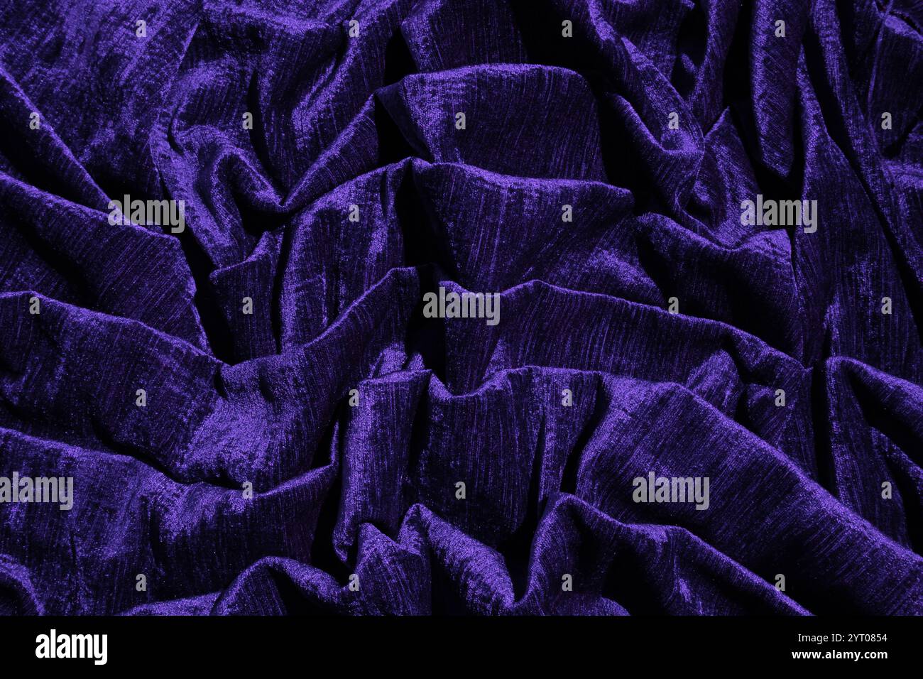 Abstract mystical background in dark blue. chic soft folds of factory velvet fabric. Luxury interior fabric for design. future dusk. Stock Photo