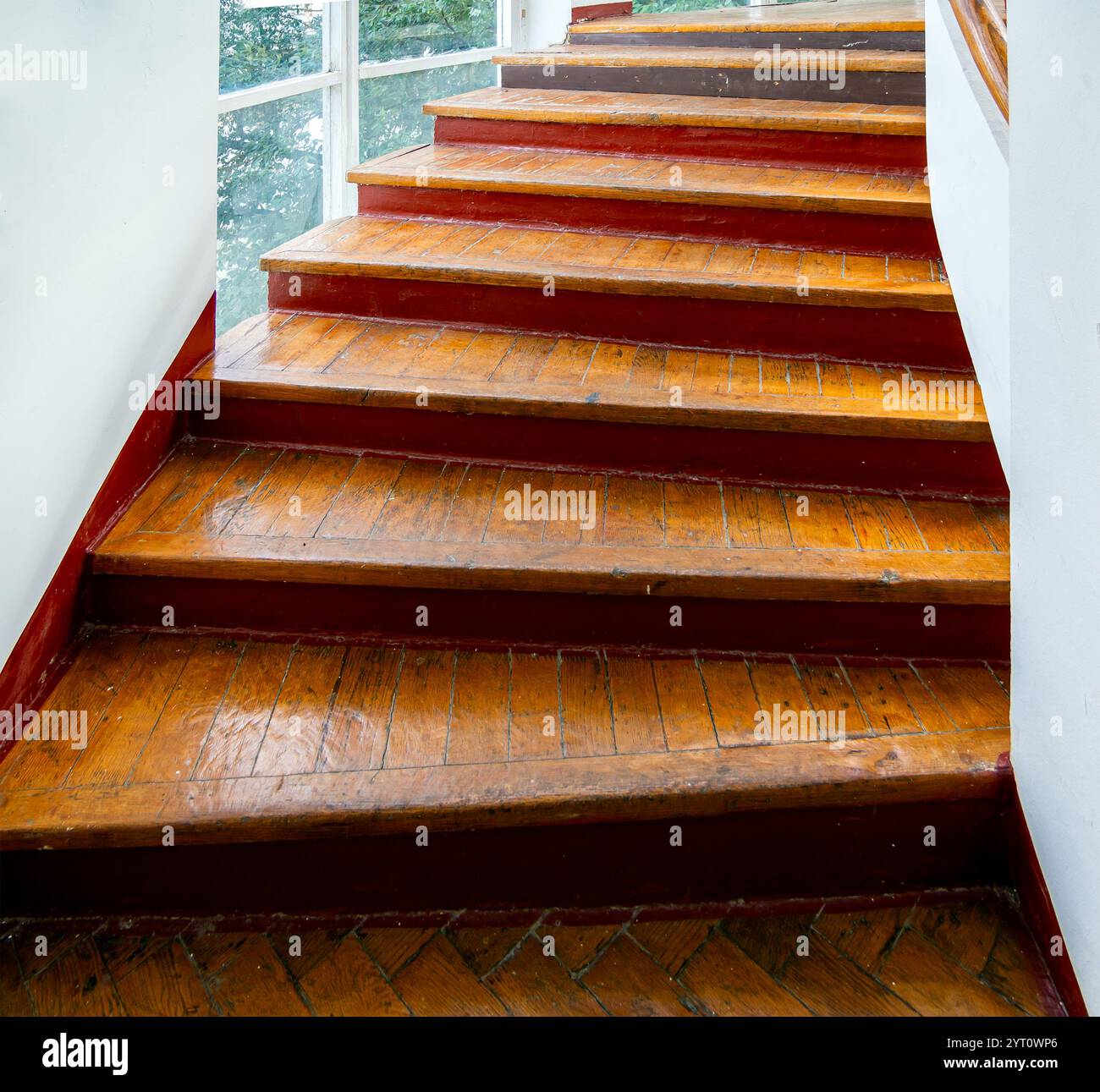 Fragment of a flight of stairs covered with old parquet boards Stock ...