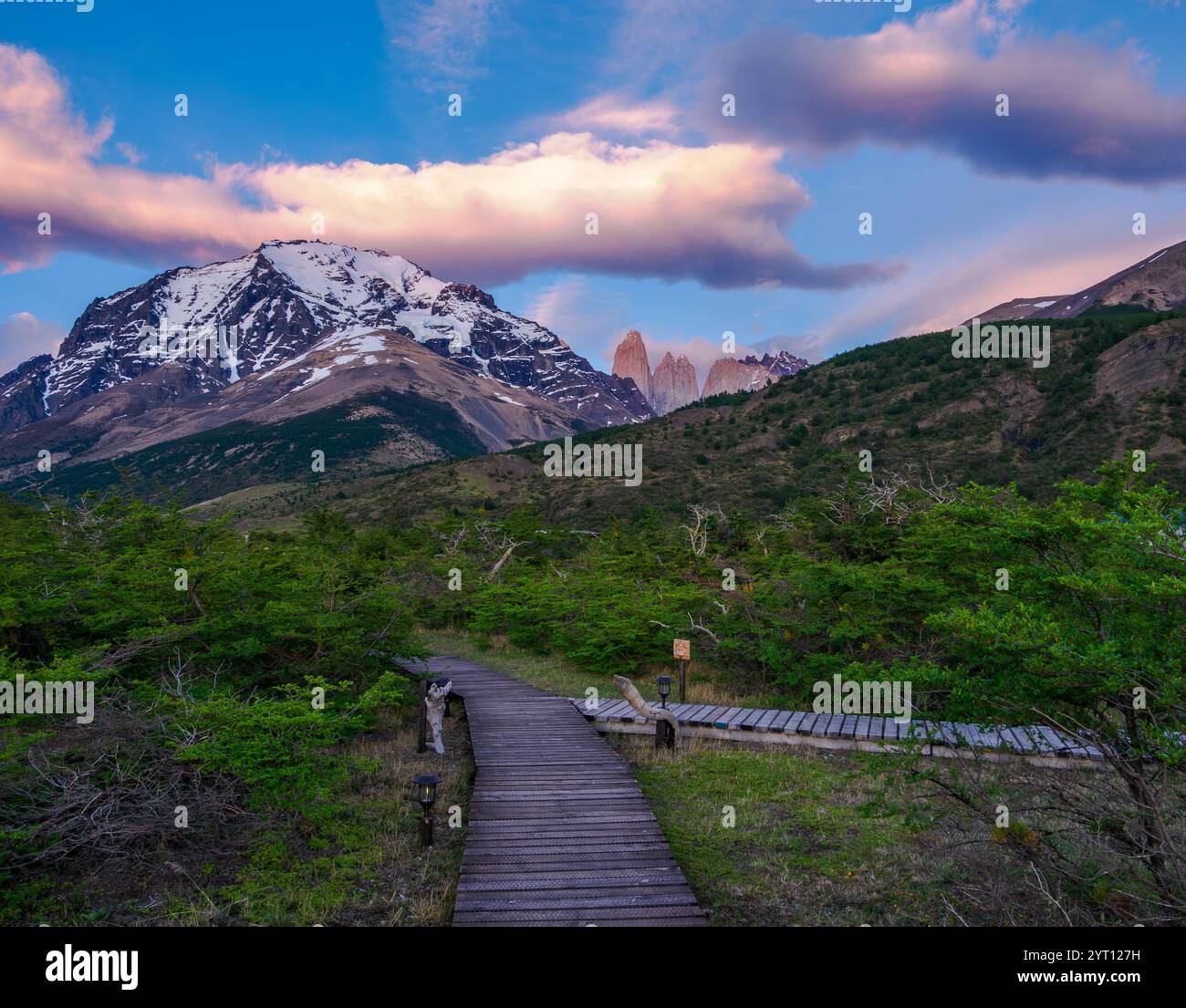 First light of dawn on the central granite towers of the Torres del Paine from EcoCamp in the Patagonian Andes of southern Chile Stock Photo