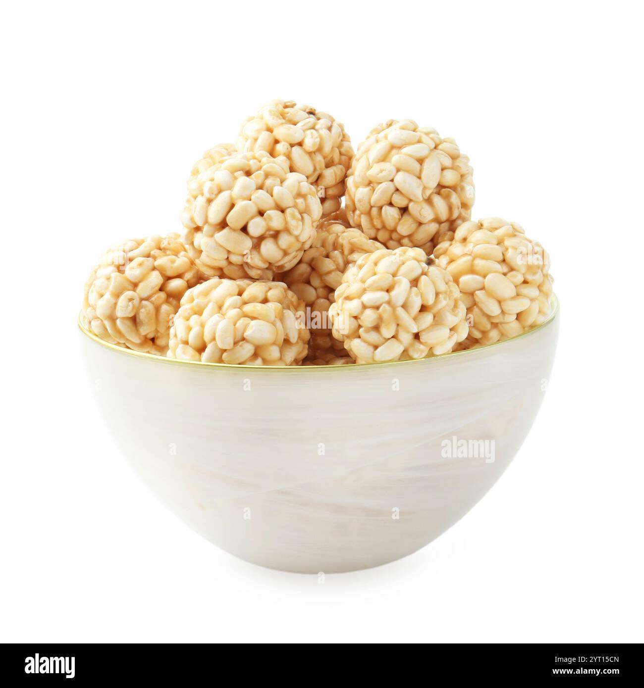 Delicious puffed rice balls in bowl isolated on white Stock Photo - Alamy