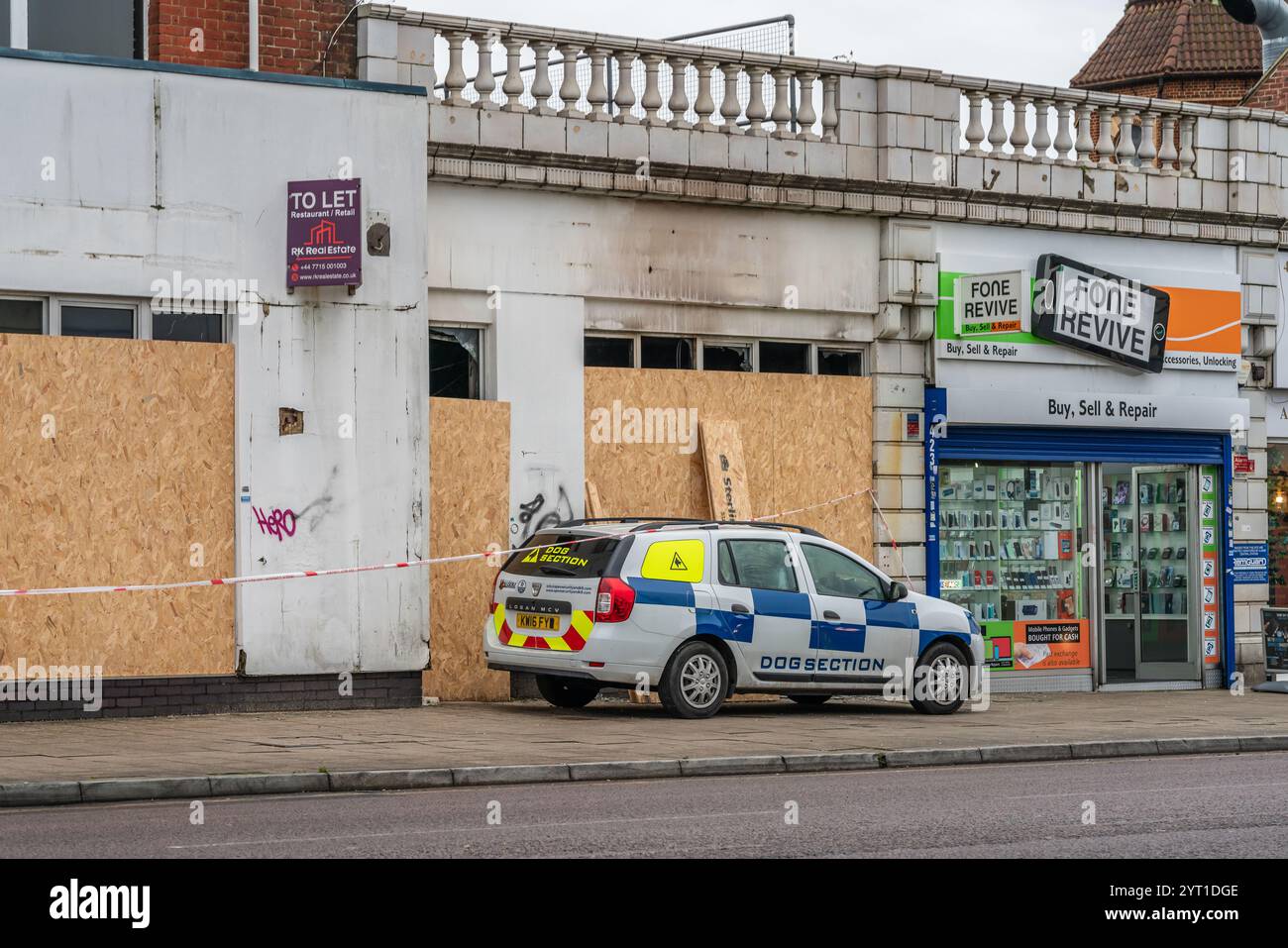 Southampton, UK. 5th December 2024. An arson investigation has been launched into a fire at a former bank in Shirley along Shirley High Street. The affected building along Shirley High Street has been cordoned off and a Police Dog Section car is parked outside whilst an investigation is carried out inside. Stock Photo