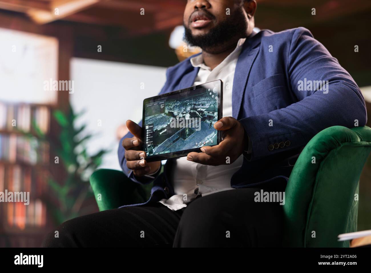 African american secret agent monitoring satellite surveillance data ...