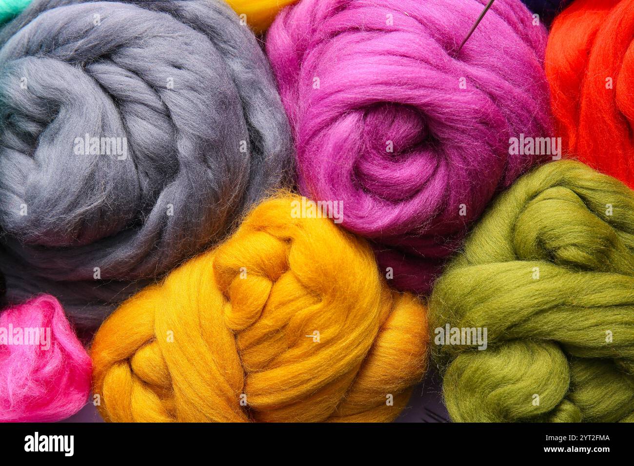 Different wool for felting as background, closeup Stock Photo