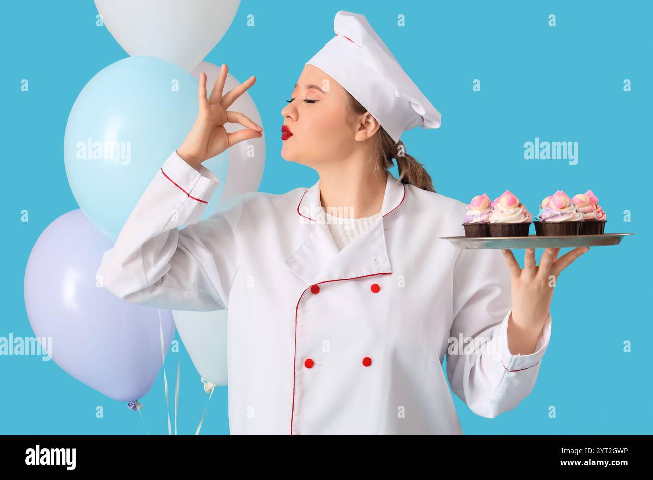 Young woman pastry chef cupcakes hi-res stock photography and images ...