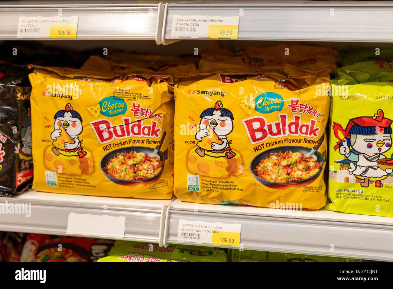 Ramen supermarket shelf, Buldak hot chicken flavour ramen packets being sold in a Norwegian supermarket,Europe,2024 Stock Photo