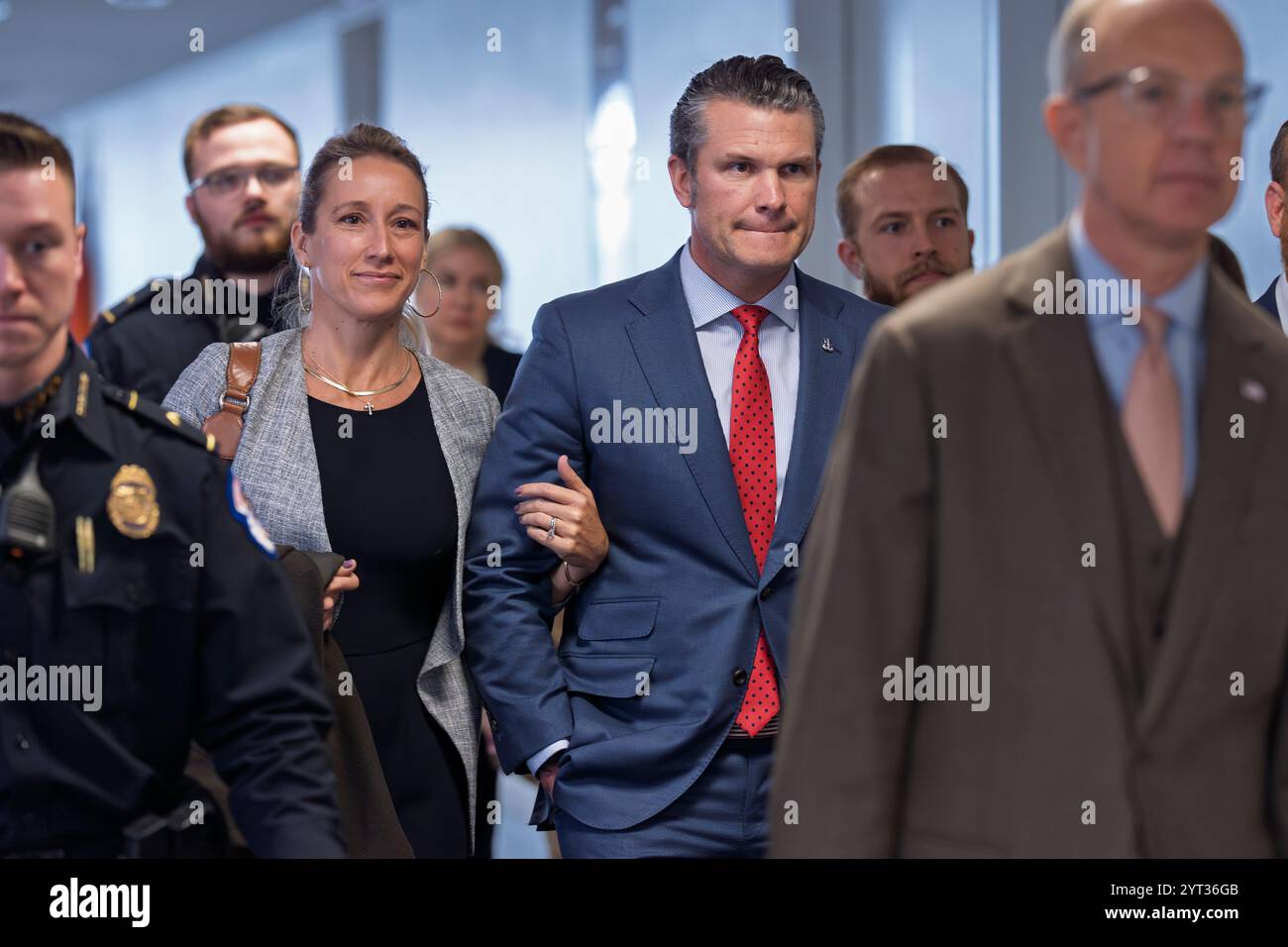 Pete Hegseth, center right, President-elect Donald Trump's nominee to be defense secretary