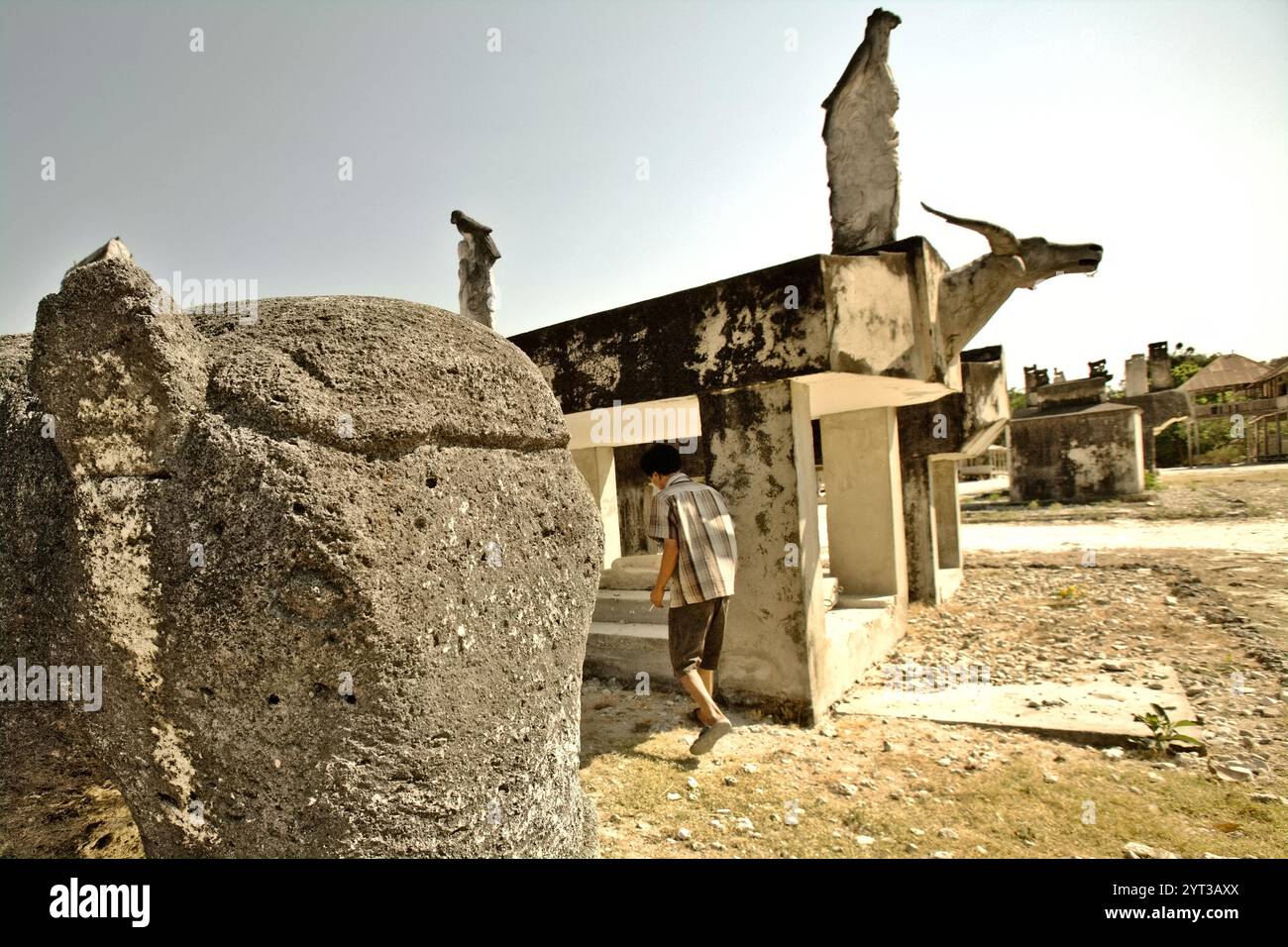 Old and new graves at traditional cemetery in traditional village of ...