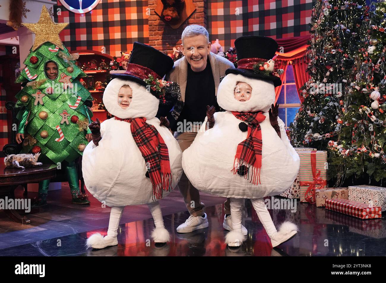 Host of The Late Late Show Patrick Kielty with Tara Dowling (5), left, from Carlow, and Cuinn O'Dowd (5), from Navan, at the unveiling of the theme and set for The Late Late Toy Show, at the RTE studios in Dublin. Picture date: Thursday December 5, 2024. Stock Photo