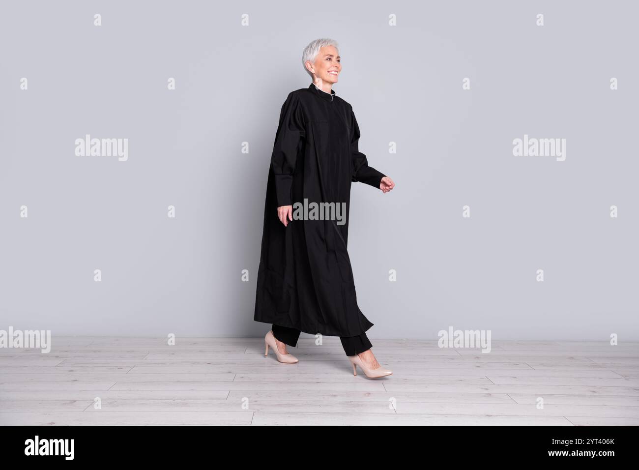 Judge Walking In Photo of smiling woman judge walk go profile side isolated grey color ...