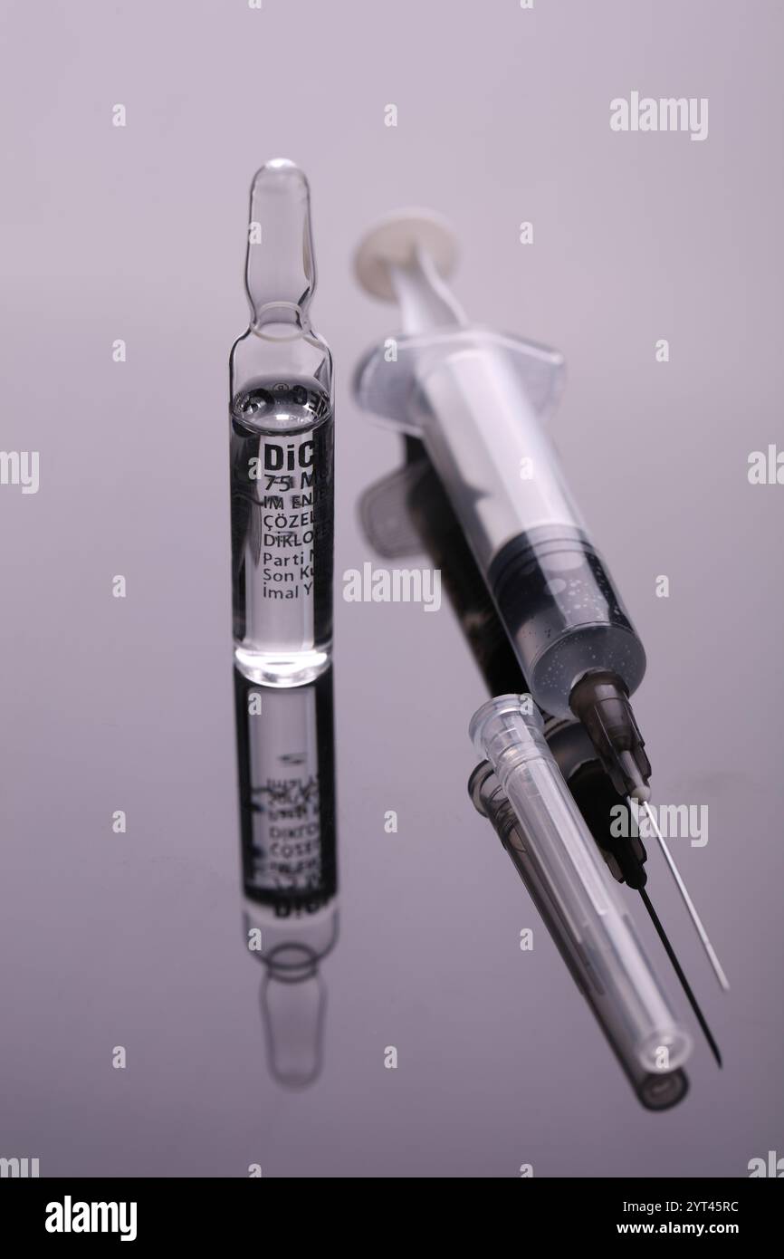 July 19, 2024: Gaziantep, Turkye. 19 July 2024. A syringe next to a ...