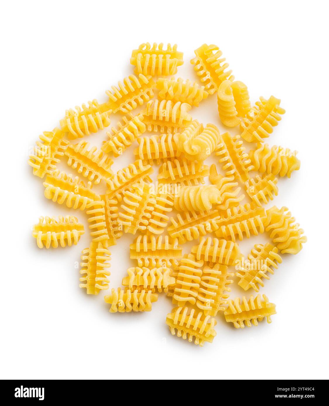 Uncooked italian pasta. Radiatori pasta isolated on a white background ...