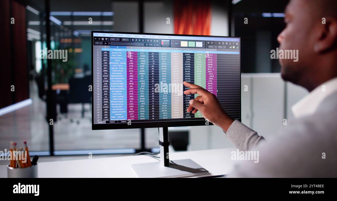Business Data Audit Spreadsheet On Analyst Computer Stock Photo