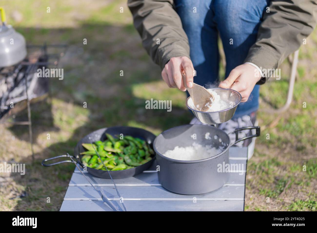 Woman serving rice hi-res stock photography and images - Alamy