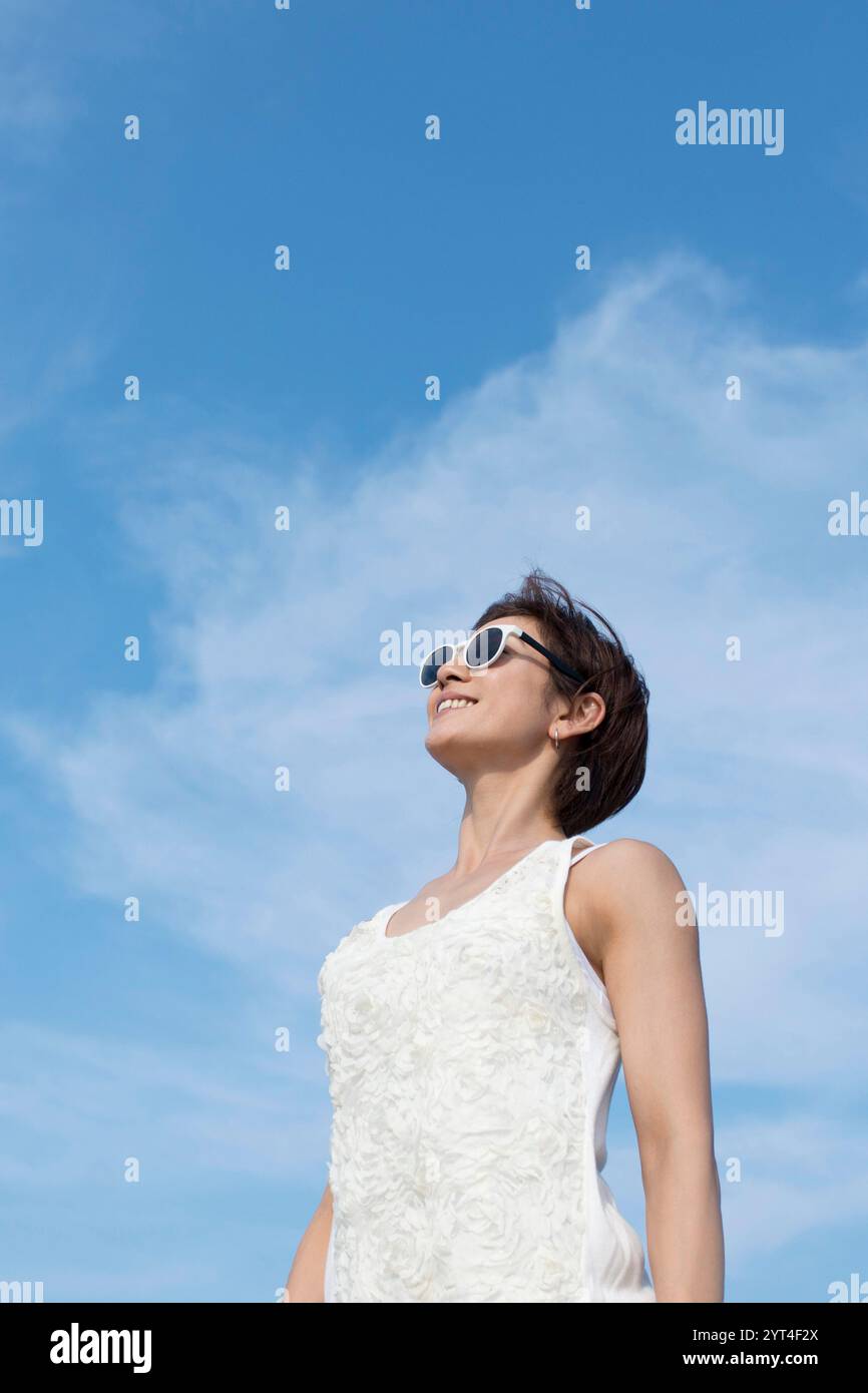 Person looking up to the sky hi-res stock photography and images - Alamy