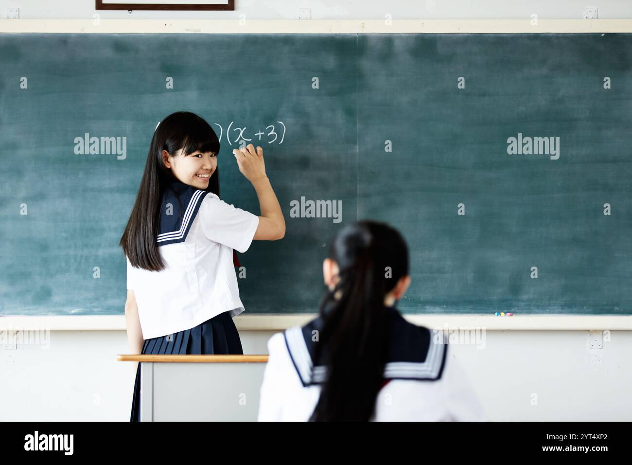 High school girls studying in a classroom Stock Photo - Alamy