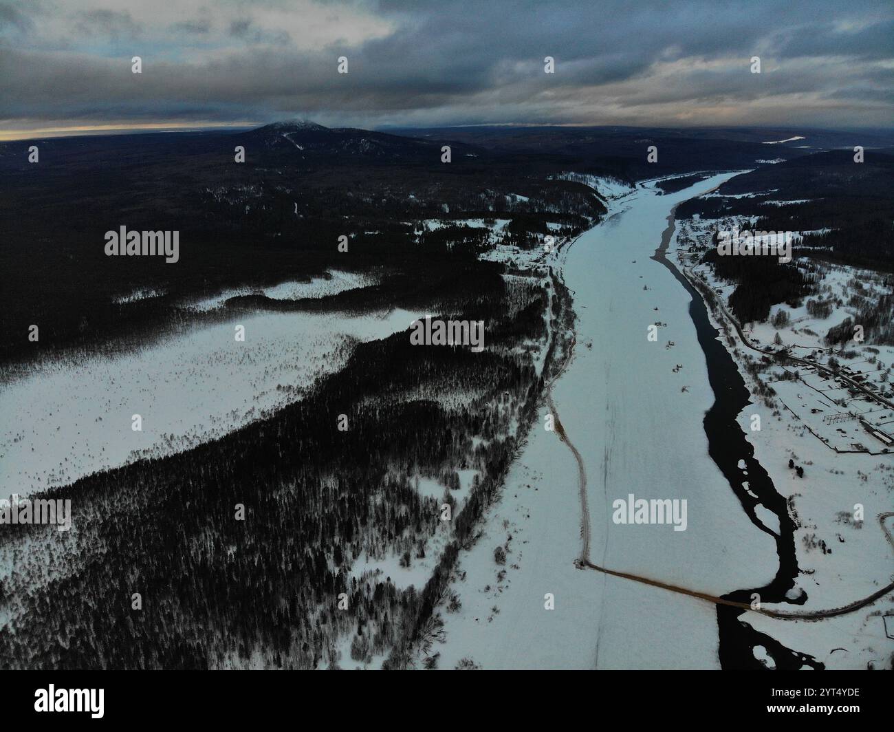 Aerial snowy mountain under cloudy hi-res stock photography and images ...