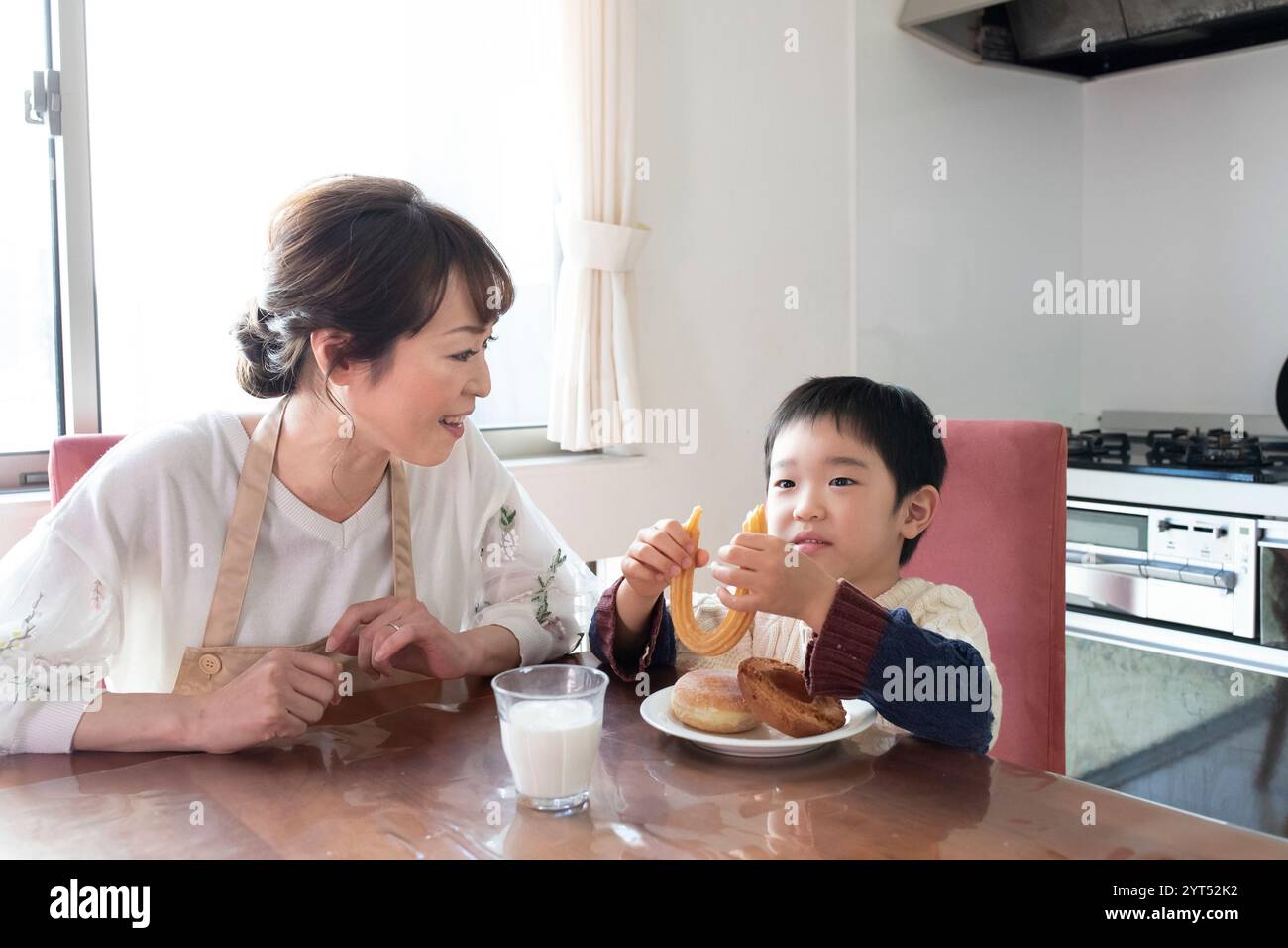 Housewife eating snack hi-res stock photography and images - Alamy