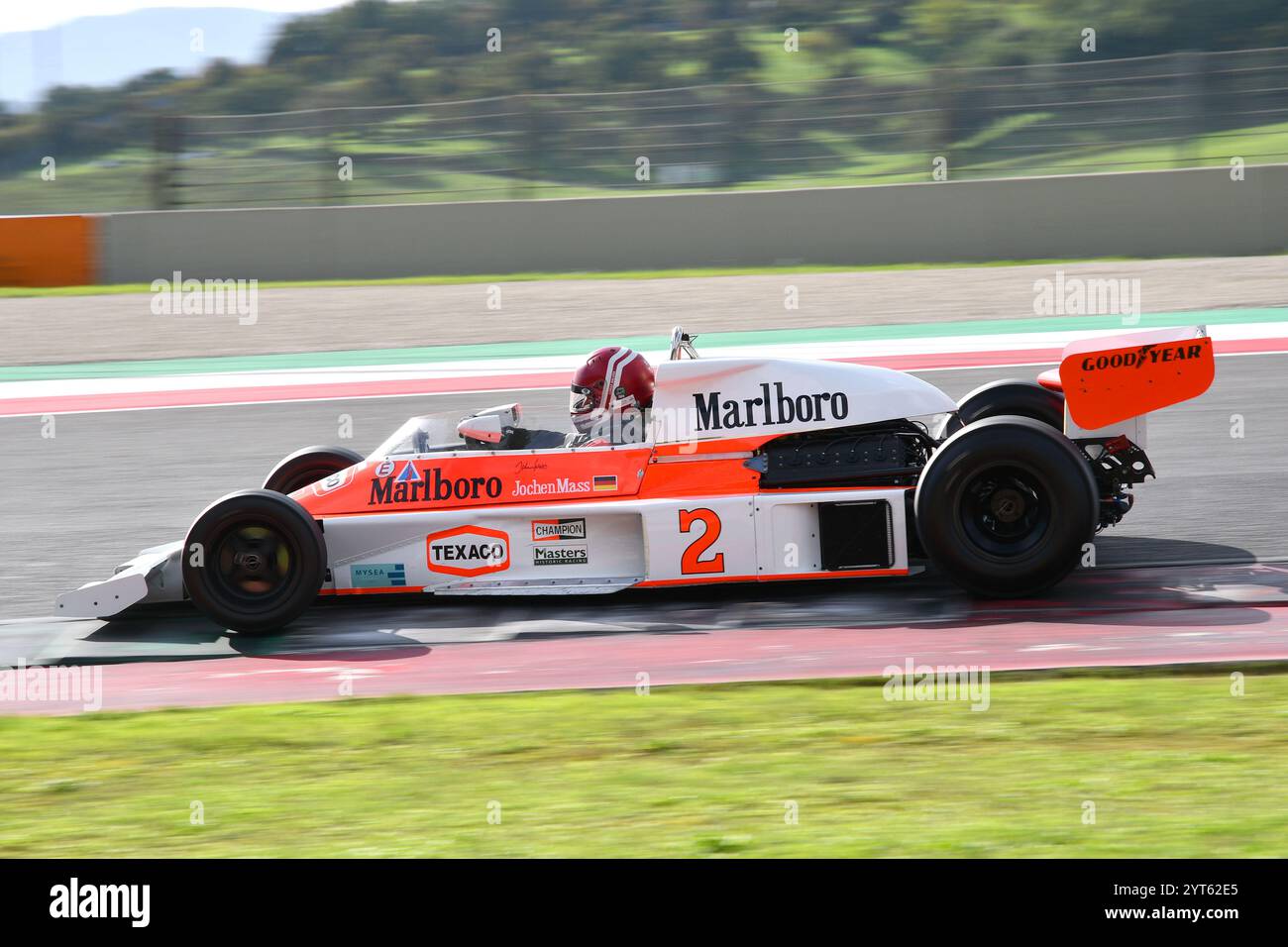 Scarperia, Italy - October 12th 2024: McLaren M23 of year 1976 ex Johen Mass and James Hunt drive by unknown in action during practice session at Muge Stock Photo