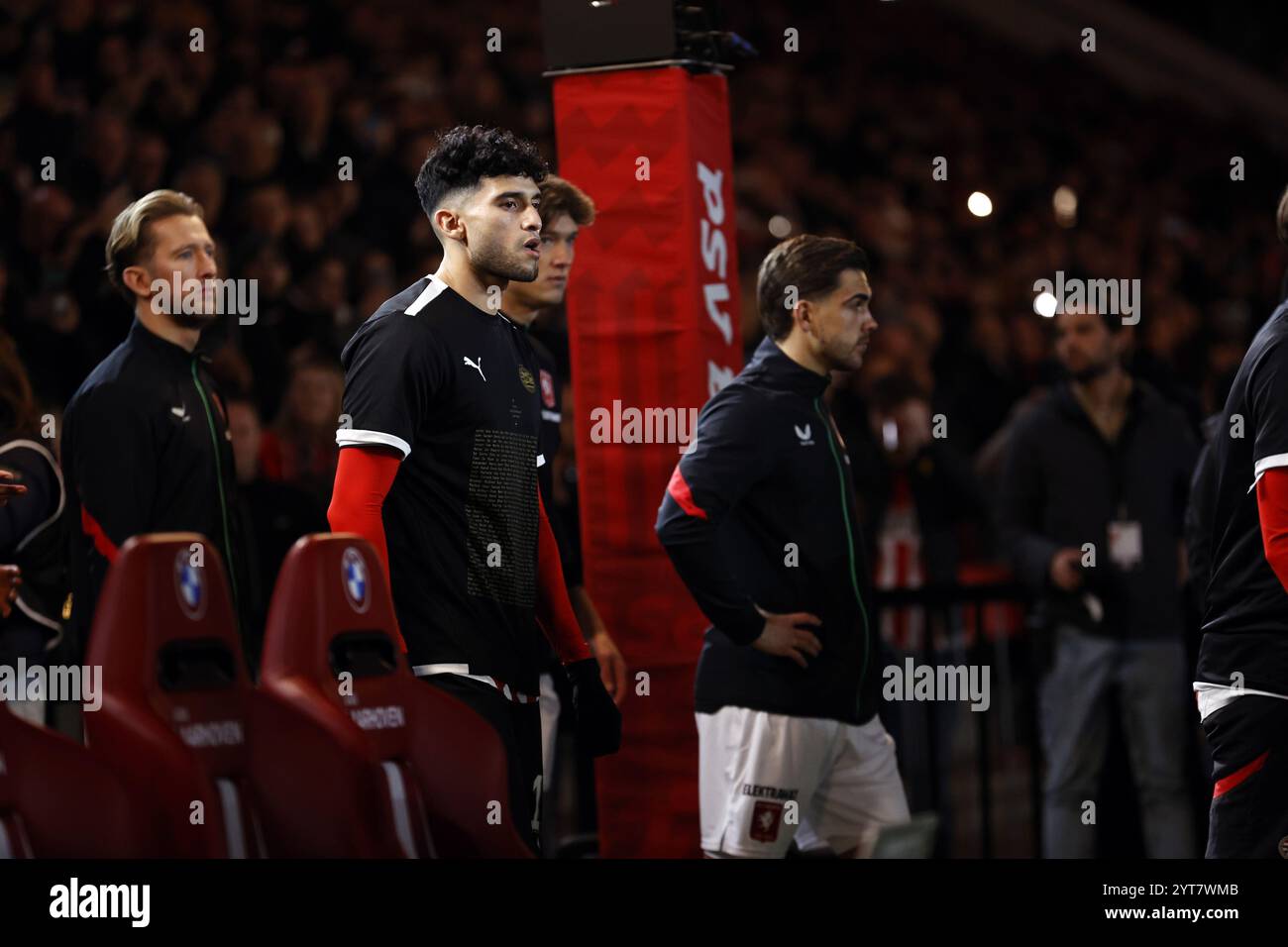 EINDHOVEN - Players of PSV wear shirts with the names of bereaved fans during the Dutch Eredivisie match between PSV Eindhoven and FC Twente at Phillips Stadium on Dec. 6, 2024 in Eindhoven, Netherlands. ANP MAURICE VAN STEEN Stock Photo
