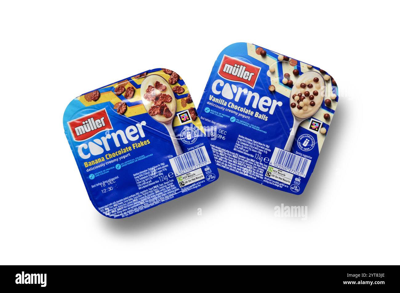 Muller Corner Yogurts pots Vanilla with chocolate balls and Banana with Chocolate Flakes top view isolated on white with clipping path Stock Photo