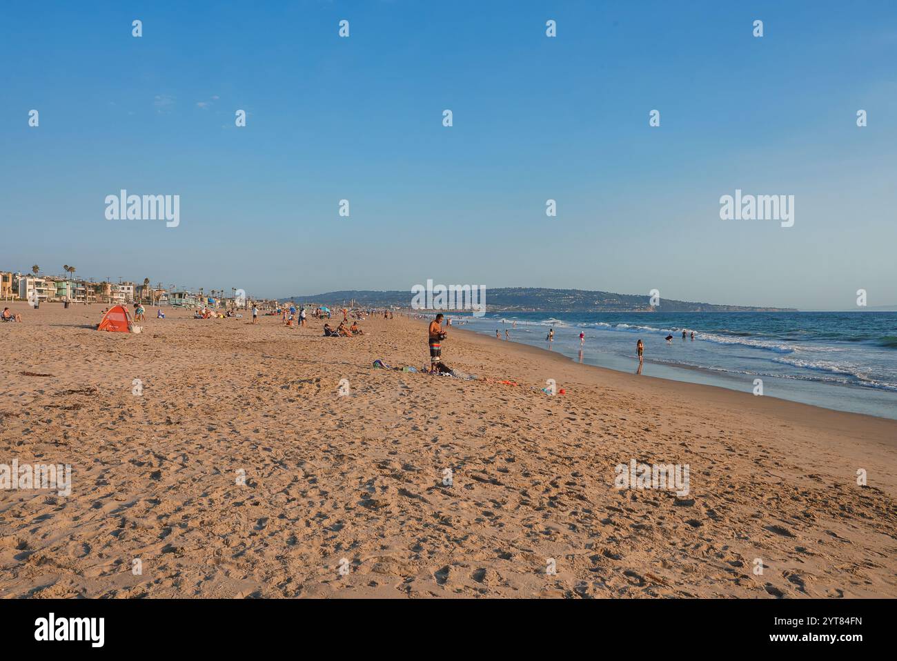 Sunny day on crowded beach hi-res stock photography and images - Alamy
