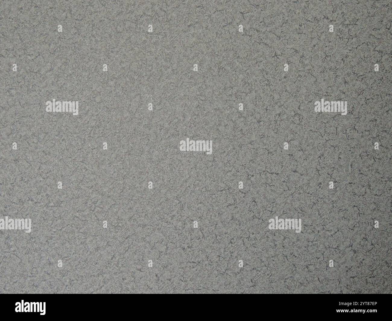 gray plain paper background with soft ribbed texture with abstract perforation, monochrome graphic resource with fine textured pattern Stock Photo