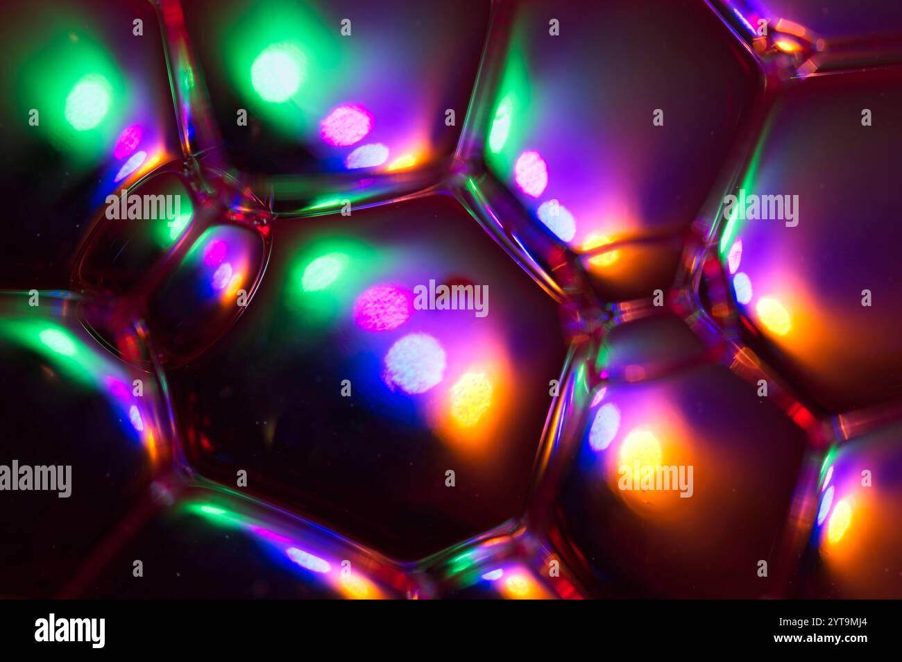 Honeycomb like structure with multi colors in background Stock Photo