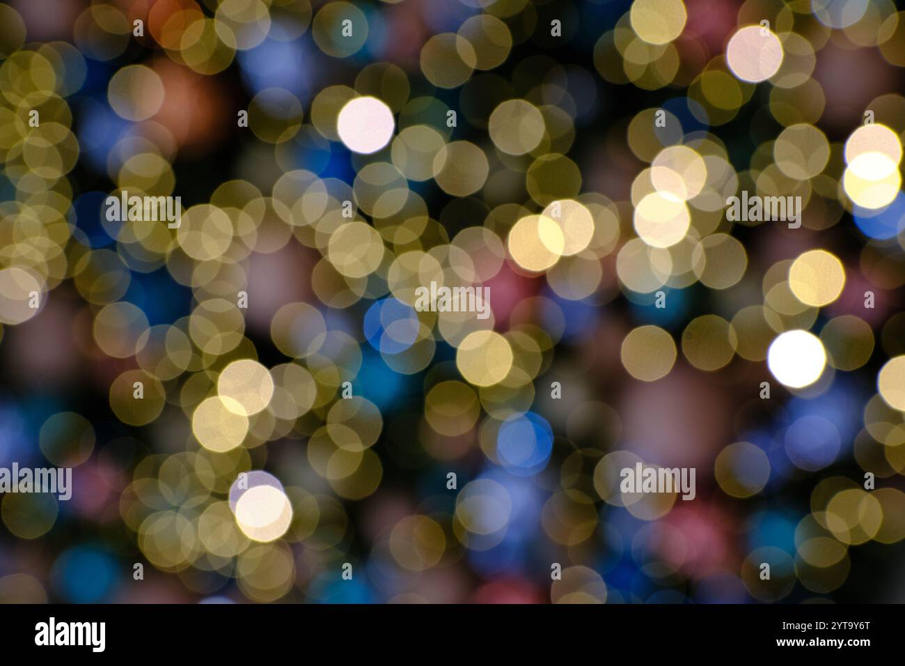 Colorful bokeh lights creating an abstract background Stock Photo