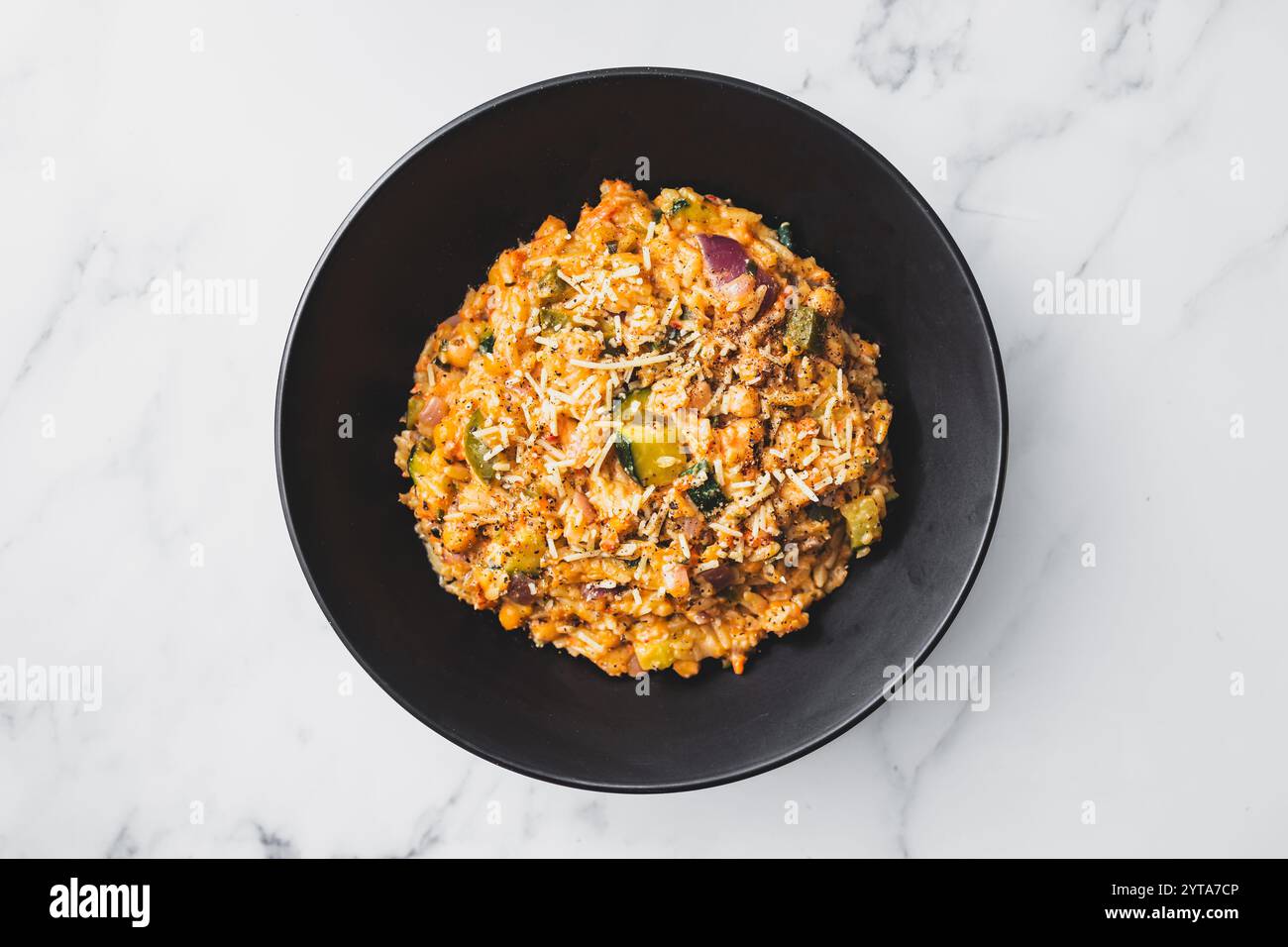 risoni with Mediterranean vegetables and creamy tomato sauce topped ...