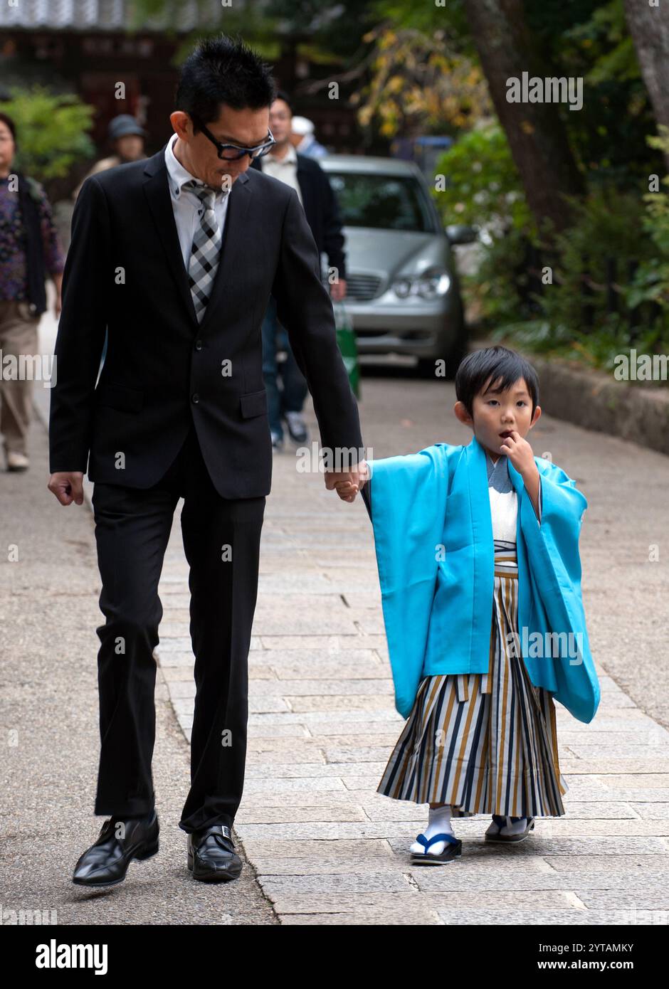 Father with young boy dressed in traditional Japanese 