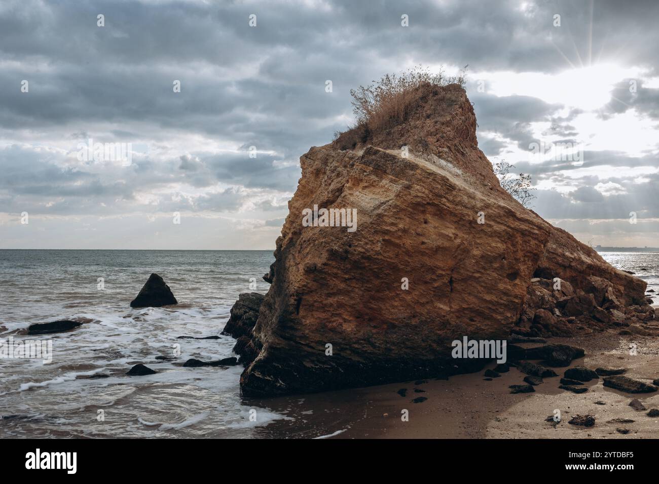 Early morning sunrise over the sea . Some clouds. Stock Photo
