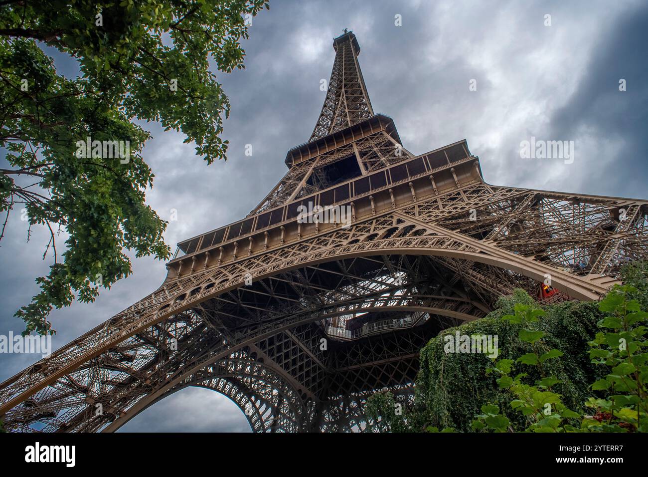 Close up of the intricate Eiffel Tower wrought iron lattice work , The Eiffel Tower is the most visited paid monument in the world , Paris ,France Stock Photo