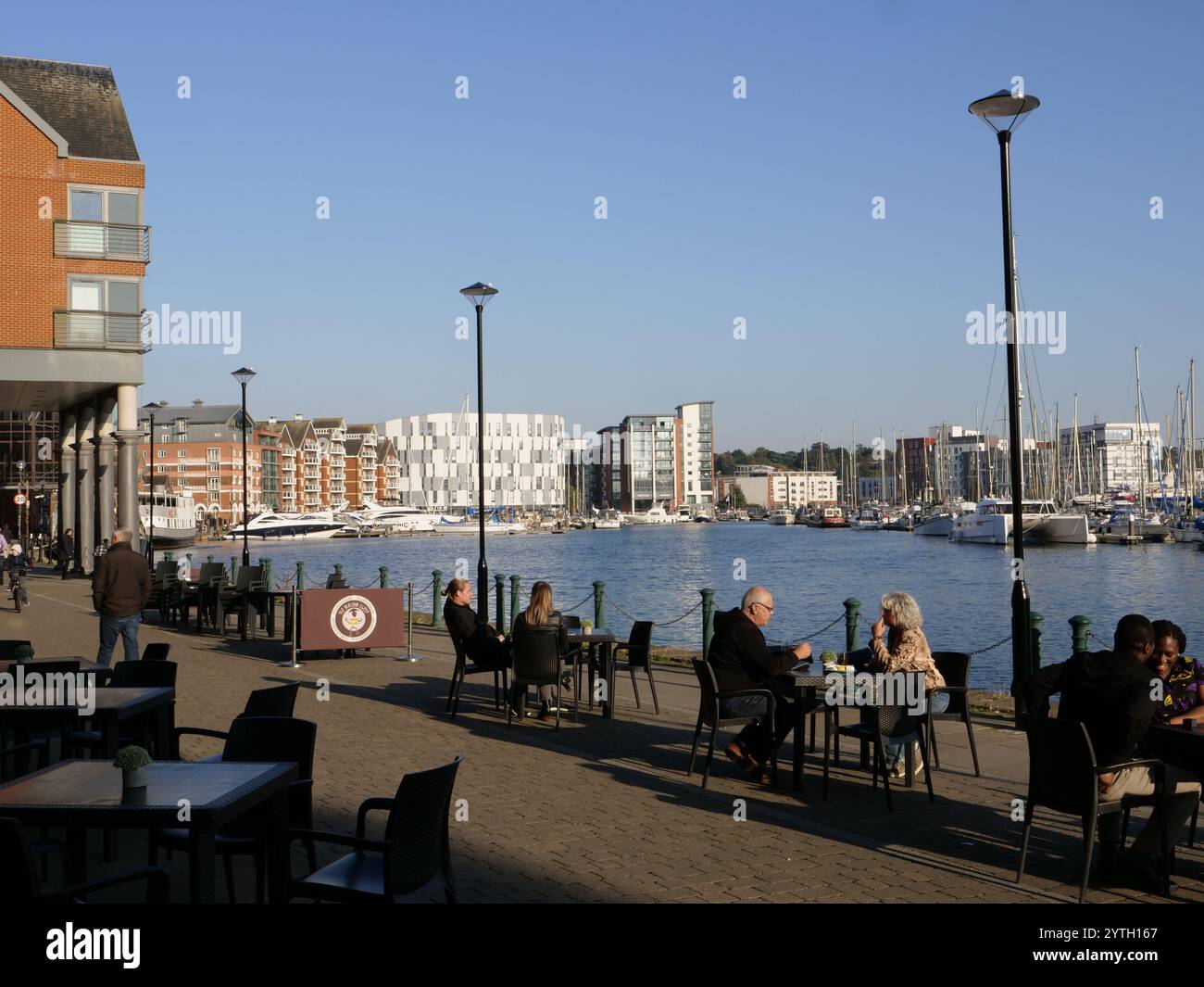Ipswich’s popular tourist destination and attraction relaxing and socialising at Neptune Quay, from the historic quay the picturesque and scenic view Stock Photo