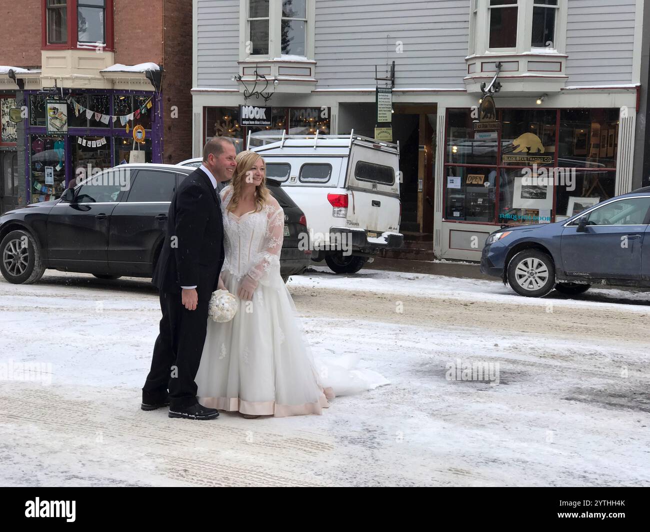 FEBRUARY, 2022, TELLURIDE COLORADO - man asks woman to marry him on Colorado Avenue, Main street, Telluride, Co. in winter Stock Photo