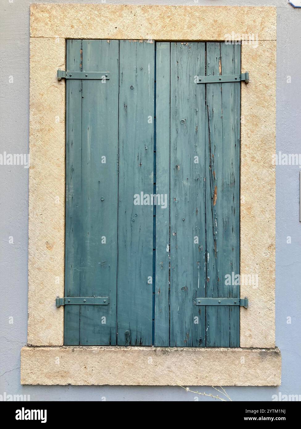 Closed green window shutters - Smartphone Captured Stock Image