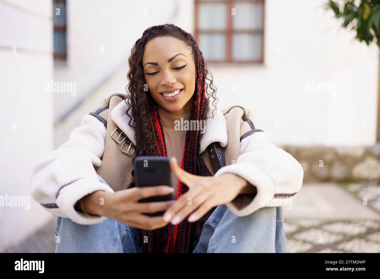 Young energetic black woman braids hi-res stock photography and images ...