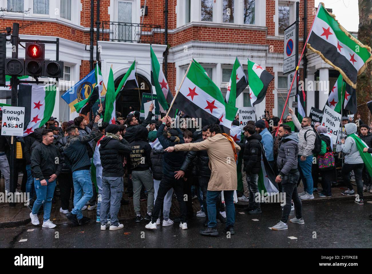 London, UK. 7th December, 2024. Jubilant Syrians attending a protest outside the Russian embassy against the Russian bombing of Idlib celebrate the latest rapid advances in Syria made by Syrian opposition groups. According to reports today, Syrian opposition fighters are taking the city of Homs and advancing on Damascus. The protest was organised by Syria Solidarity Campaign. Credit: Mark Kerrison/Alamy Live News Stock Photo