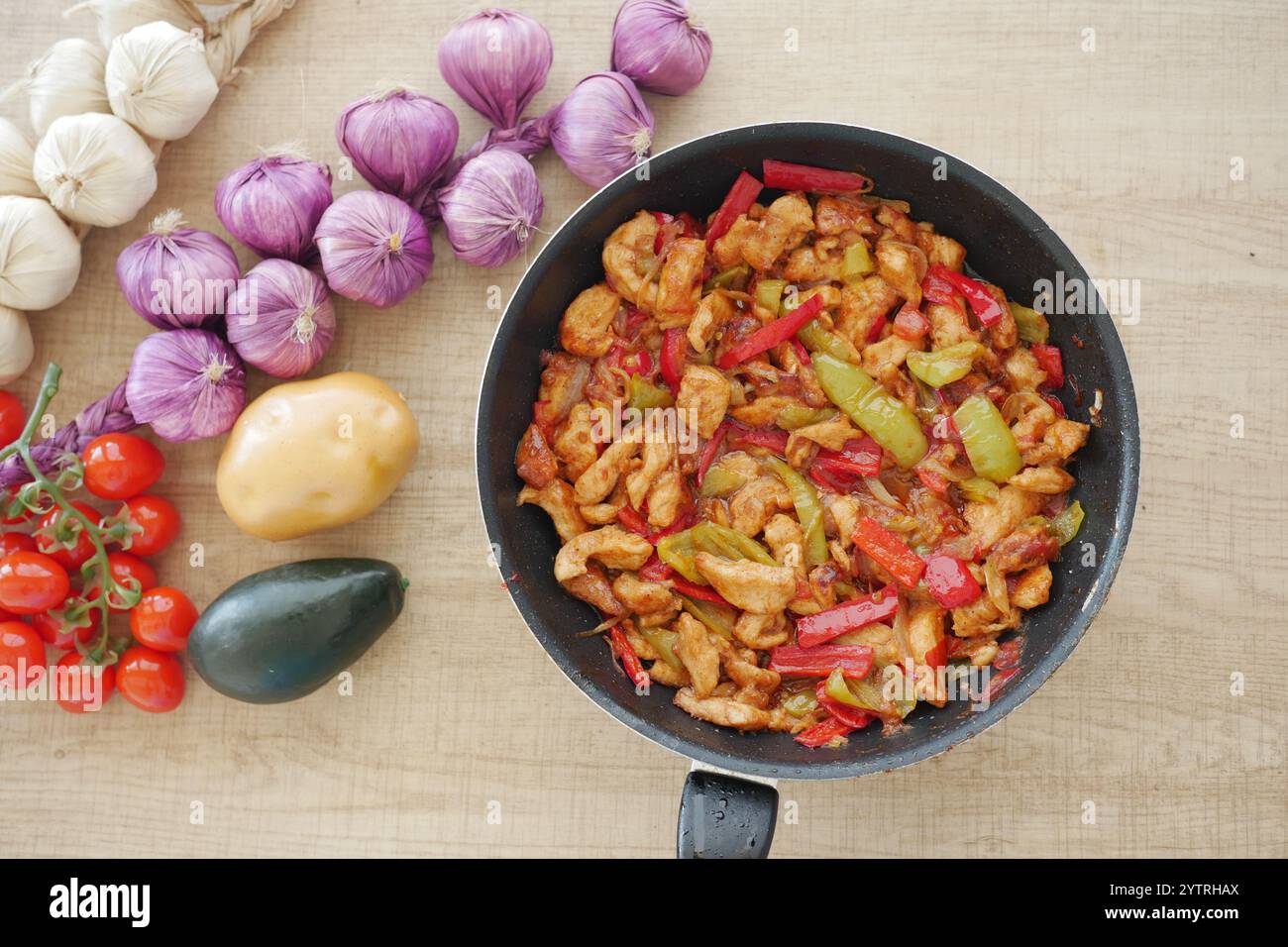 Savor the Delicious Chicken StirFry Loaded with Colorful Vegetables Stock Photo
