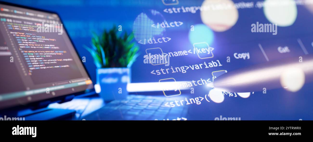 Work from home. Programmer coding code on notebook screen at Stock Photo