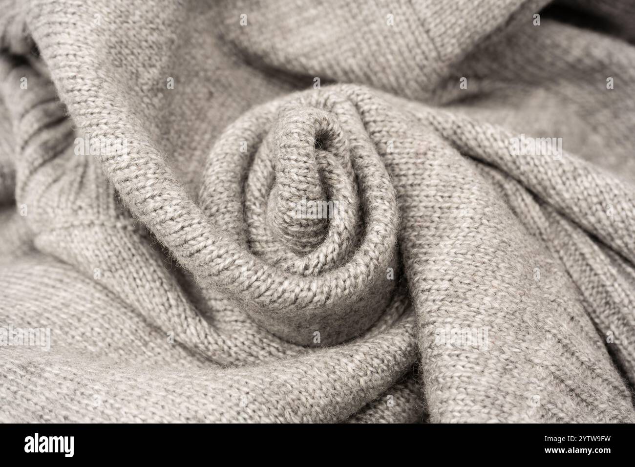 Grey wool sweater texture as a background. Top view. Stock Photo