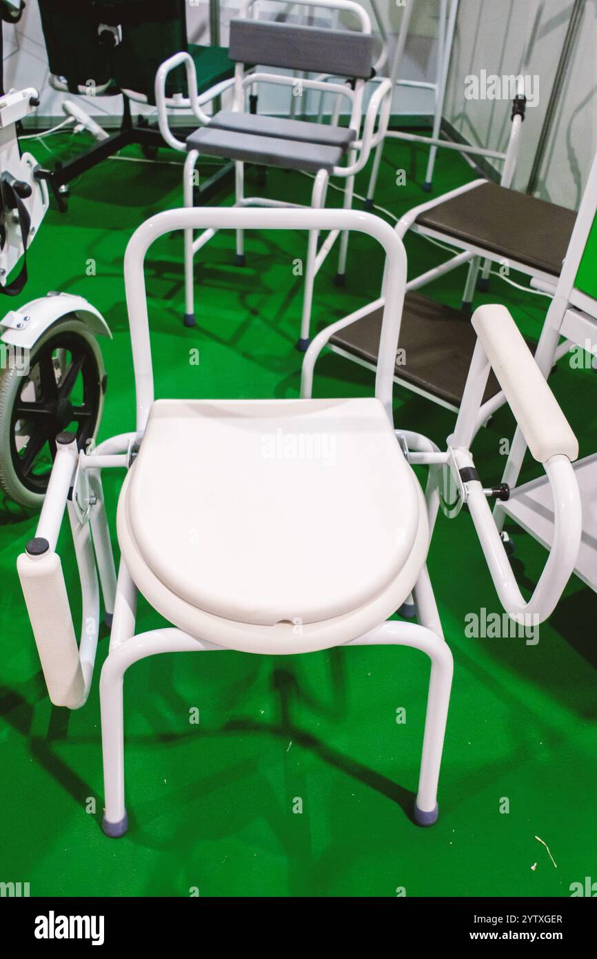 Chair with armrests hi-res stock photography and images - Alamy
