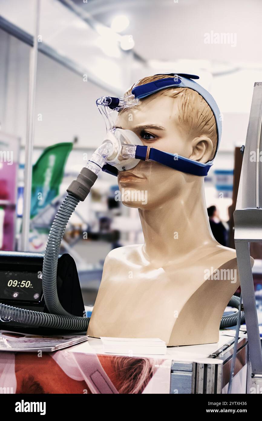 Breathing mask on the patient. Technology in the treatment of respiratory failure for the treatment of respiratory diseases. Automatic regulation of b Stock Photo