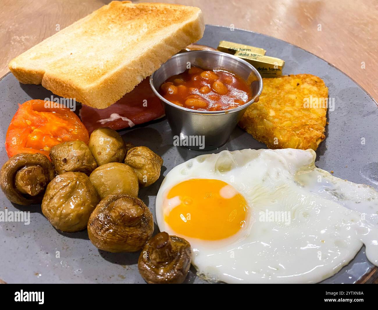 An all day English breakfast at a restaurant. - Smartphone Captured Stock Image